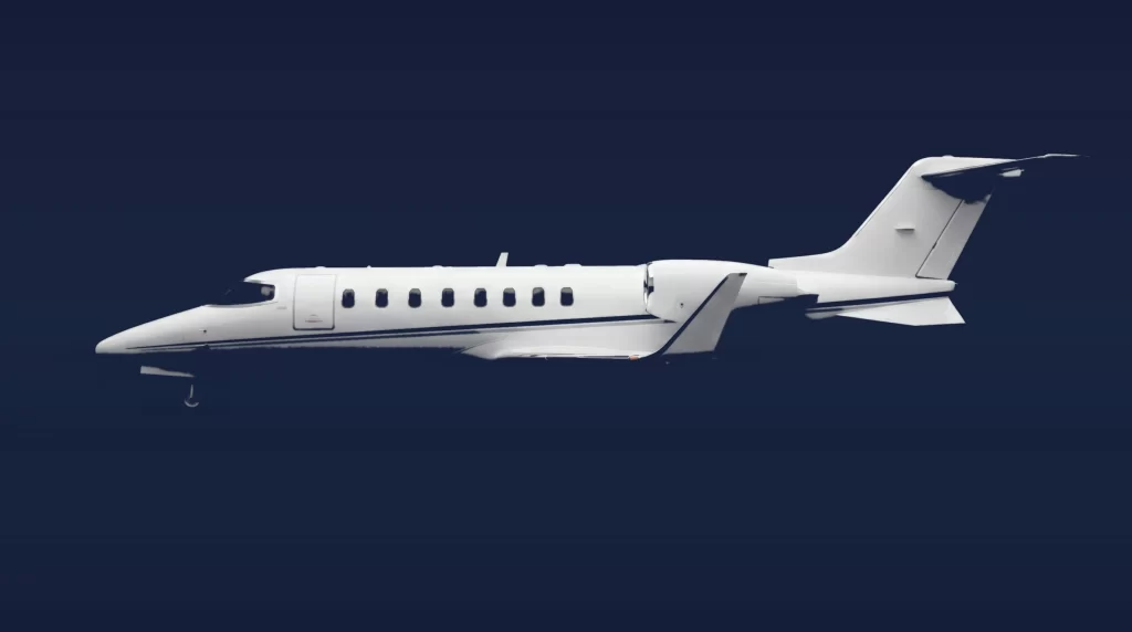 Bombardier Learjet 45 private charter aircraft, left-side profile on a deep navy studio background