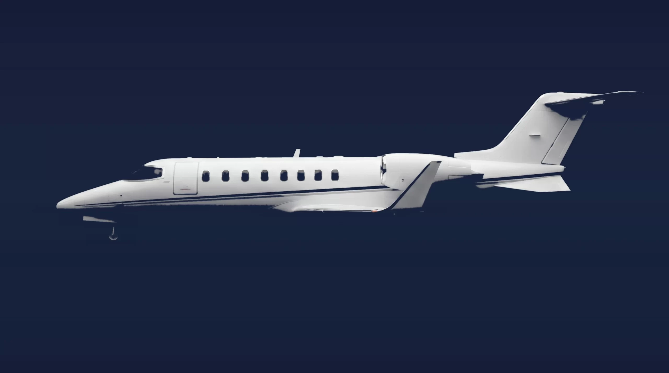 Bombardier Learjet 45 private charter aircraft, left-side profile on a deep navy studio background