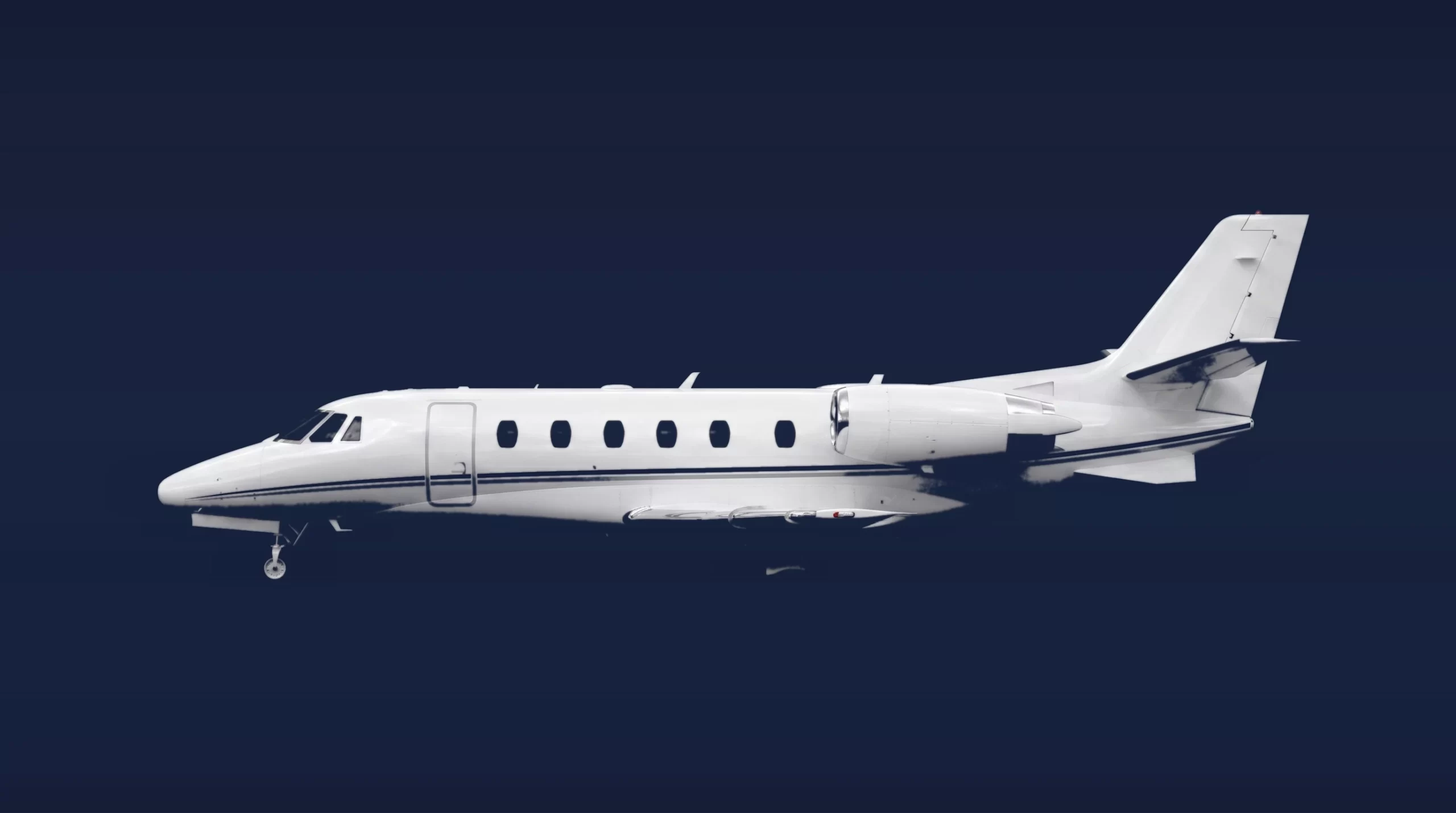 Cessna Citation XLS+ private charter aircraft, left-side profile on a deep navy studio background
