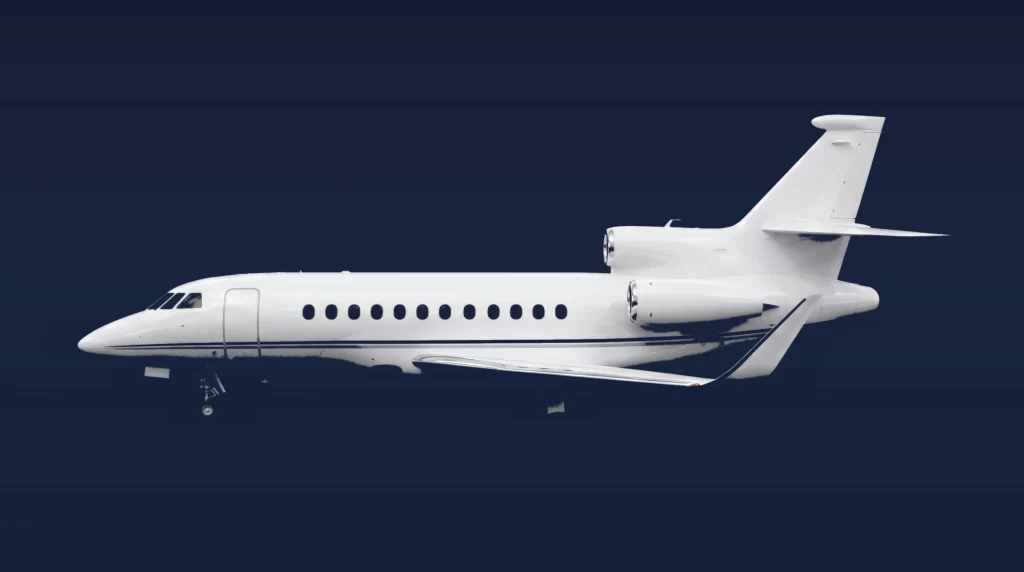 Dassault Falcon 900EX private charter aircraft, left-side profile on a deep navy studio background